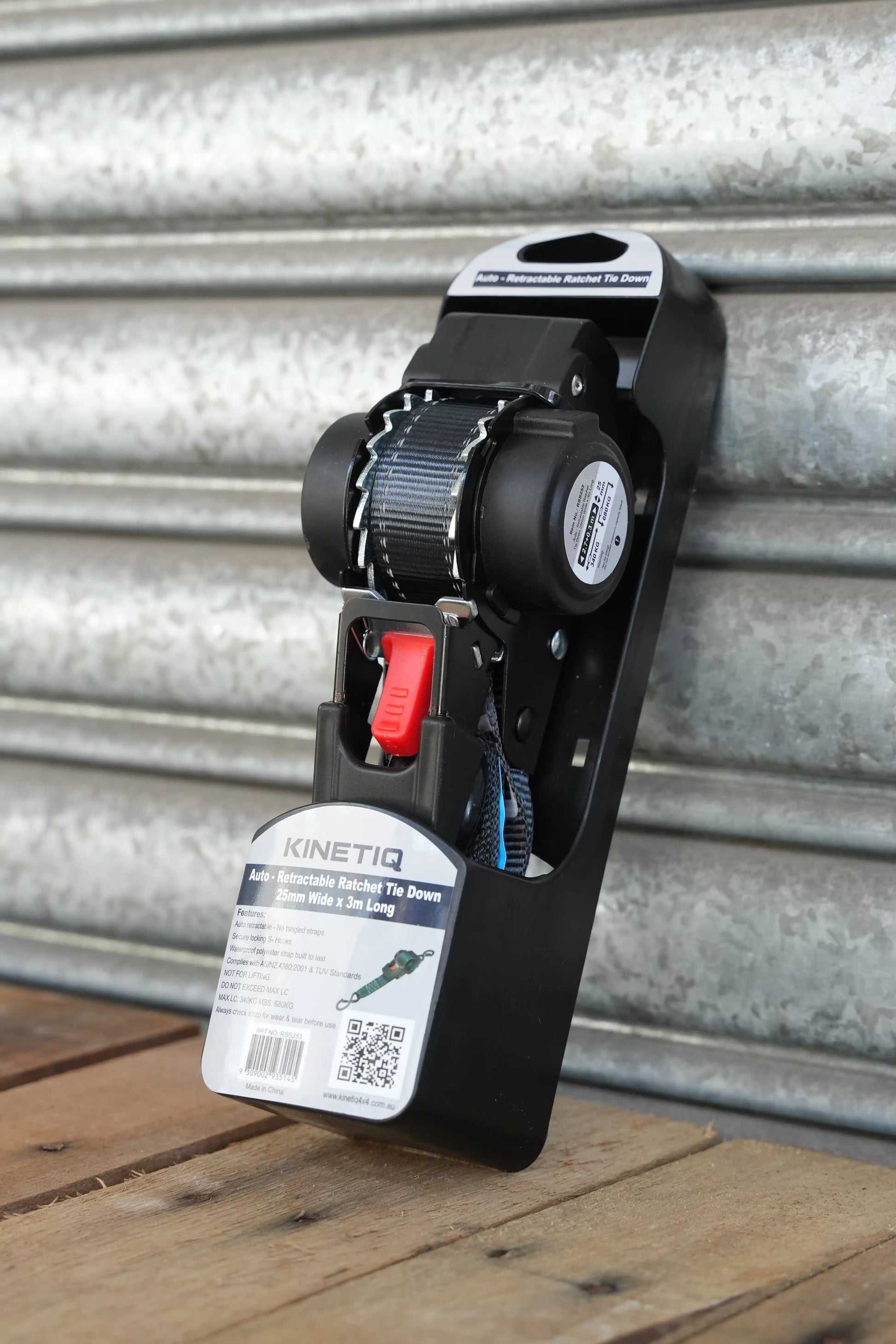 KINETIQ Automatic Retractable Ratchet Strap, 3m long and 25mm wide, with a black and orange ratchet mechanism and durable strap.