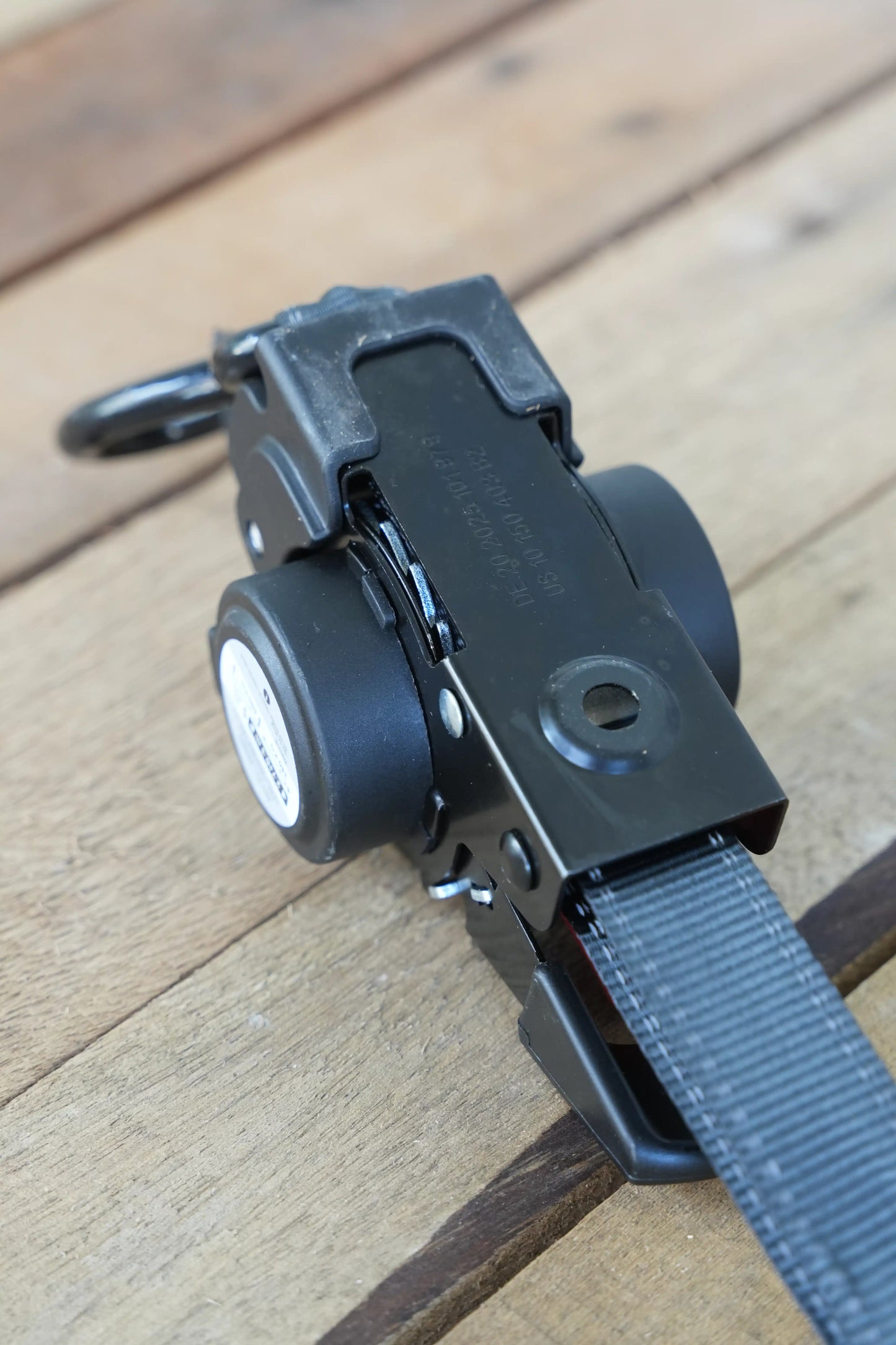 KINETIQ Automatic Retractable Ratchet Strap, 3m long and 25mm wide, with a black and orange ratchet mechanism and durable strap.